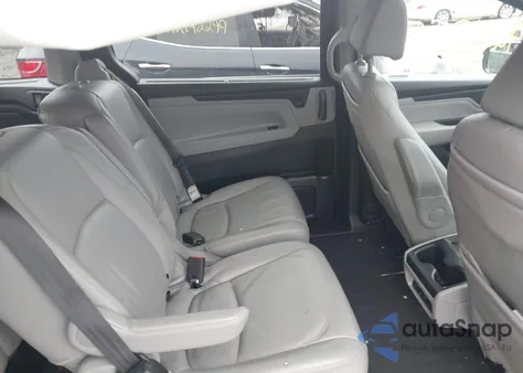 2020 Honda Odyssey Touring z USA, uszkodzony, nr VIN 5FNRL6H84LB037439